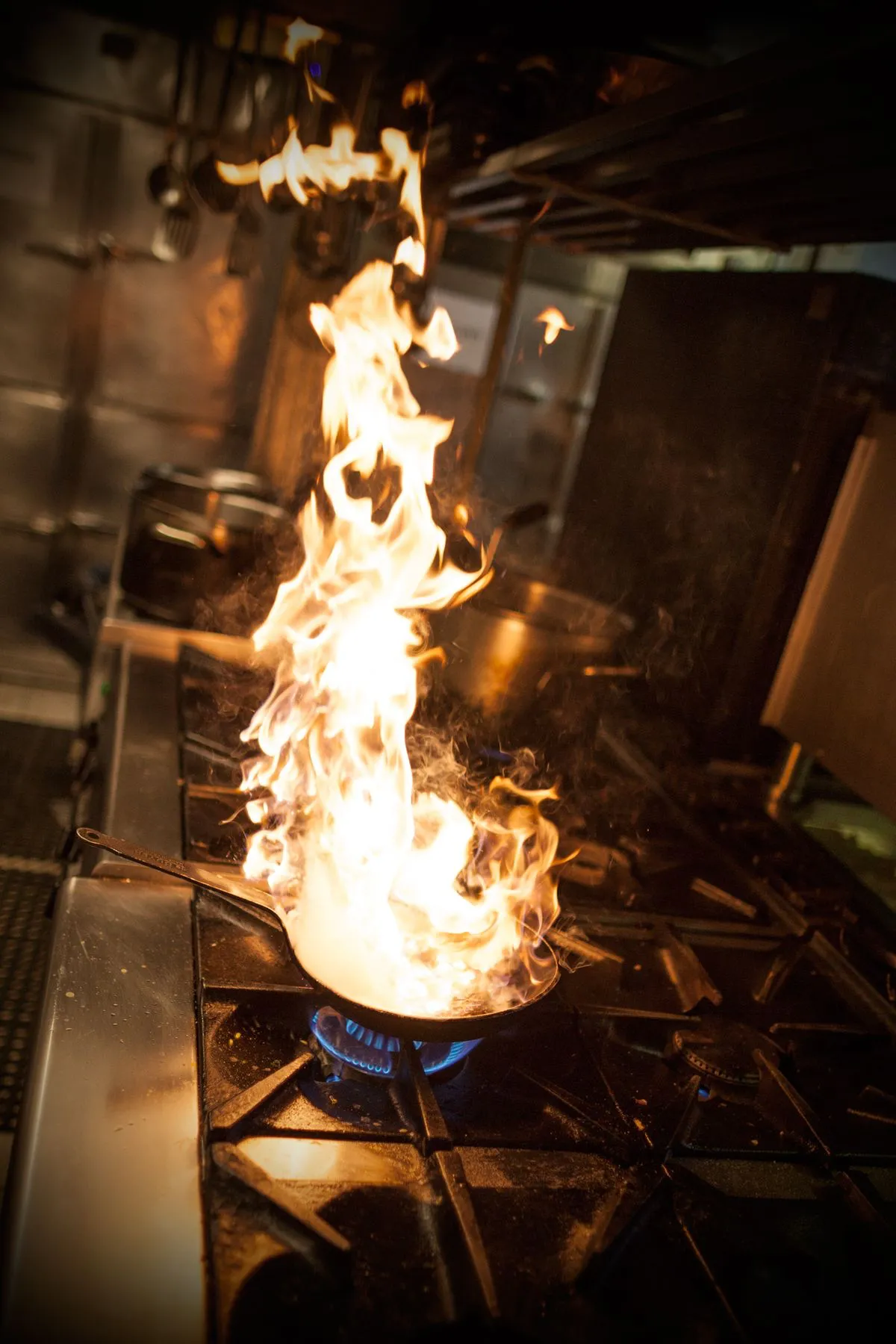 Flames on the grill at Bernardo's Burritos